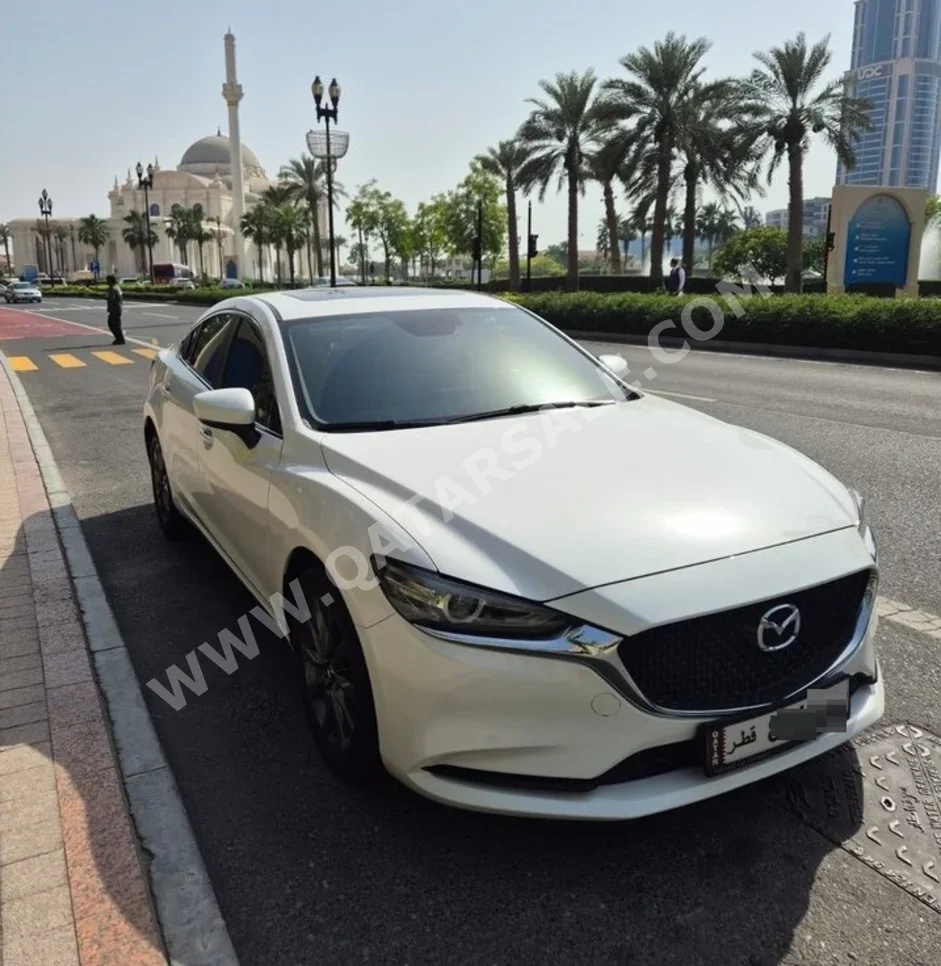 مازدا  مازدا 6  الترا  2022  اوتوماتيك  45,000 كم  4 سلندر  سحب امامي  سيدان  أبيض  تحت الضمان