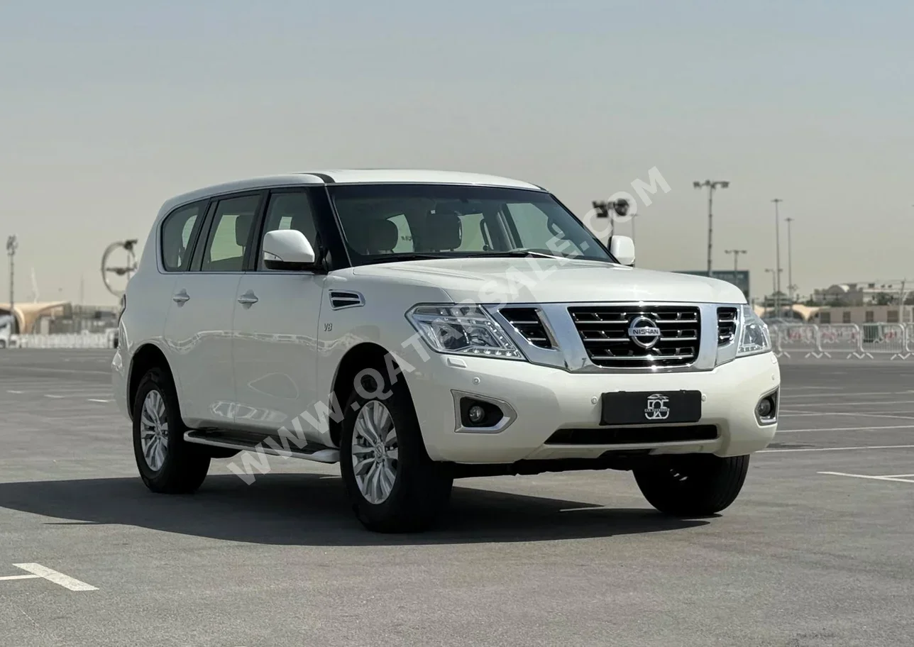 Nissan  Patrol  SE  2015  Automatic  139,000 Km  8 Cylinder  Four Wheel Drive (4WD)  SUV  White