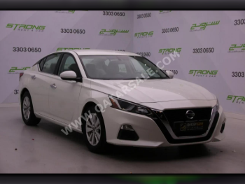 Nissan  Altima  2021  Automatic  60,000 Km  4 Cylinder  Front Wheel Drive (FWD)  Sedan  White