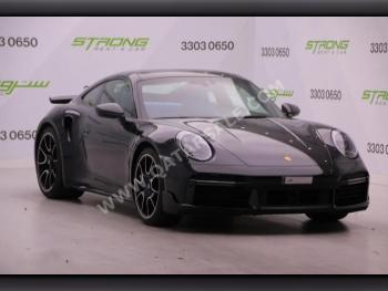 Porsche  911  Turbo  2022  Automatic  29,000 Km  6 Cylinder  Rear Wheel Drive (RWD)  Coupe / Sport  Black  With Warranty
