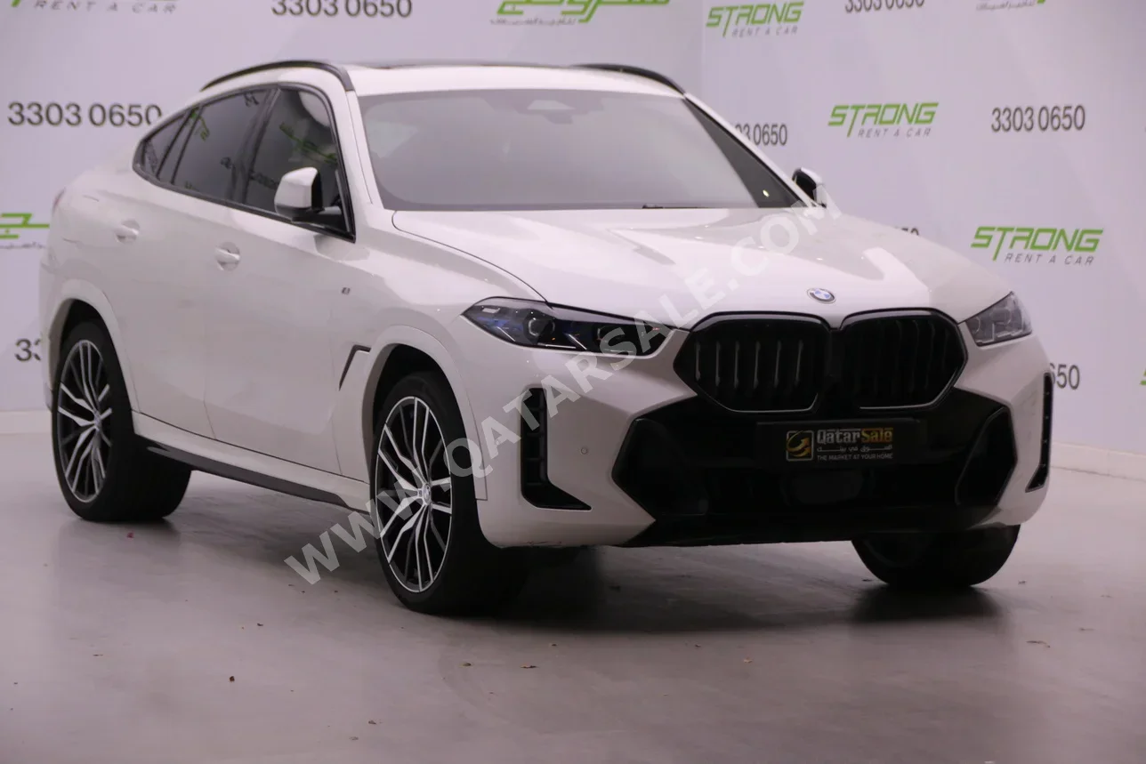 BMW  X-Series  X6 40i  2024  Automatic  28,000 Km  6 Cylinder  Four Wheel Drive (4WD)  SUV  White  With Warranty