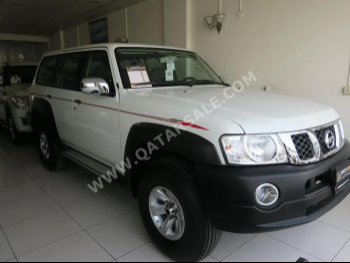 Nissan  Patrol  Safari  2022  Manual  64,000 Km  6 Cylinder  Four Wheel Drive (4WD)  SUV  White