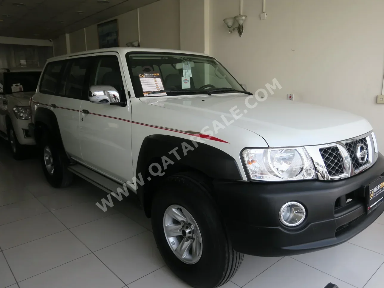Nissan  Patrol  Safari  2022  Manual  64,000 Km  6 Cylinder  Four Wheel Drive (4WD)  SUV  White