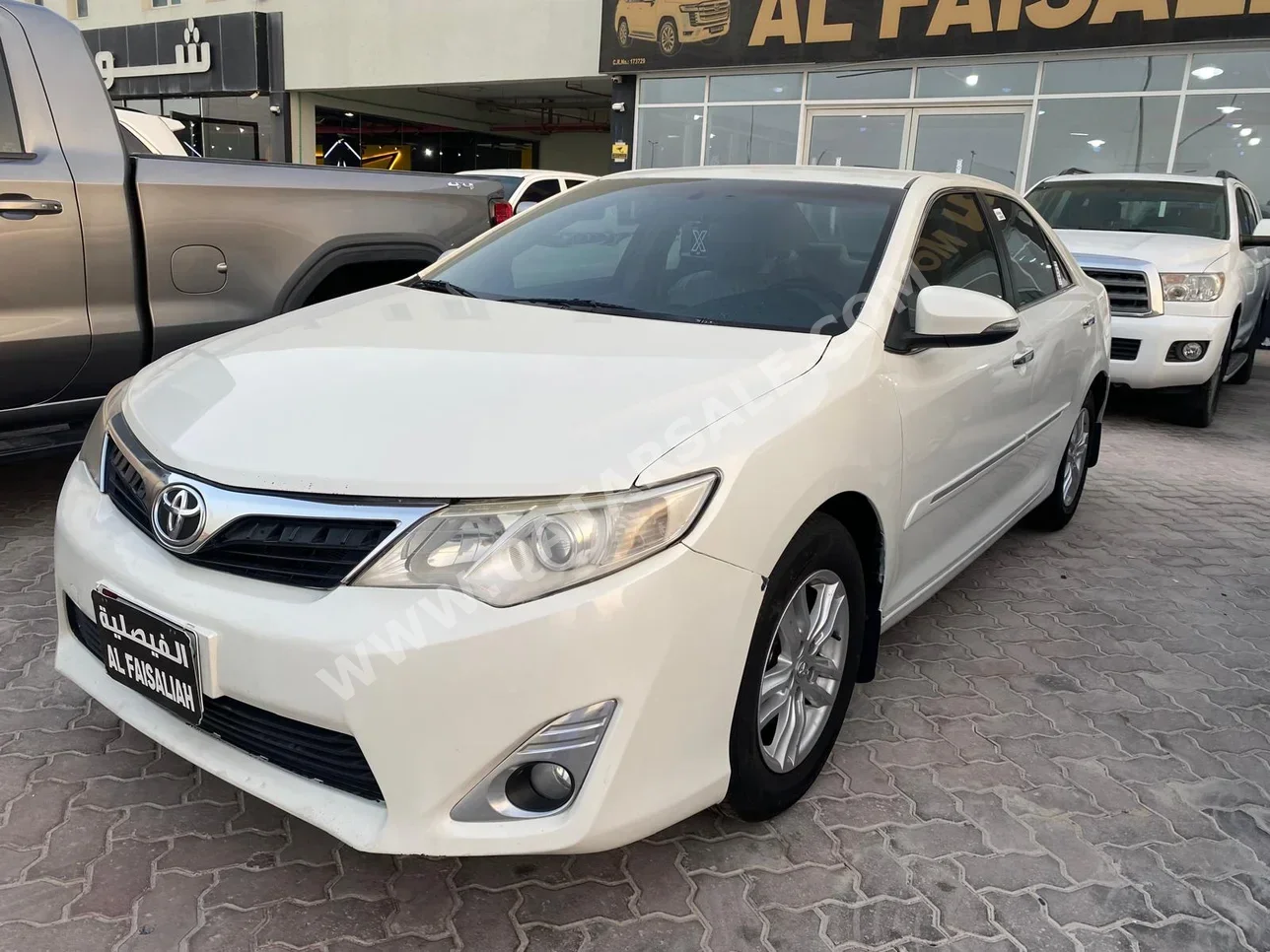 Toyota  Camry  GLX  2014  Automatic  320,000 Km  4 Cylinder  Front Wheel Drive (FWD)  Sedan  White