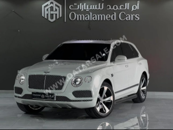 Bentley  Bentayga  2017  Automatic  106,000 Km  12 Cylinder  Four Wheel Drive (4WD)  SUV  White
