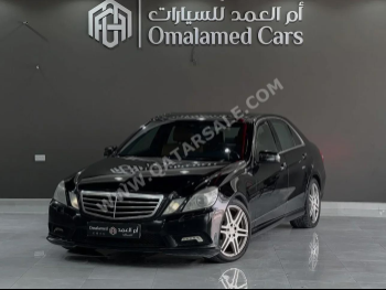 Mercedes-Benz  E-Class  350  2010  Automatic  318,000 Km  4 Cylinder  Rear Wheel Drive (RWD)  Sedan  Black