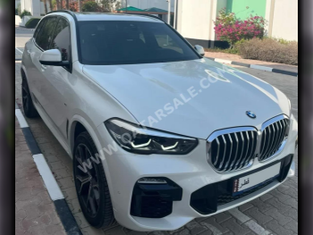 BMW  X-Series  X5 40i  2020  Automatic  77,000 Km  6 Cylinder  Four Wheel Drive (4WD)  SUV  White