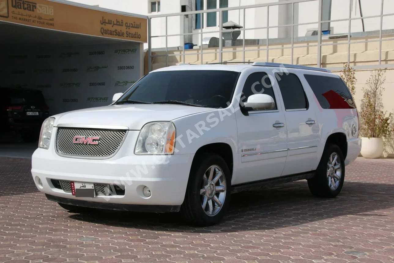 جي ام سي  يوكون  دينالي  2009  اوتوماتيك  130,000 كم  8 سلندر  دفع رباعي  اس يو في  أبيض