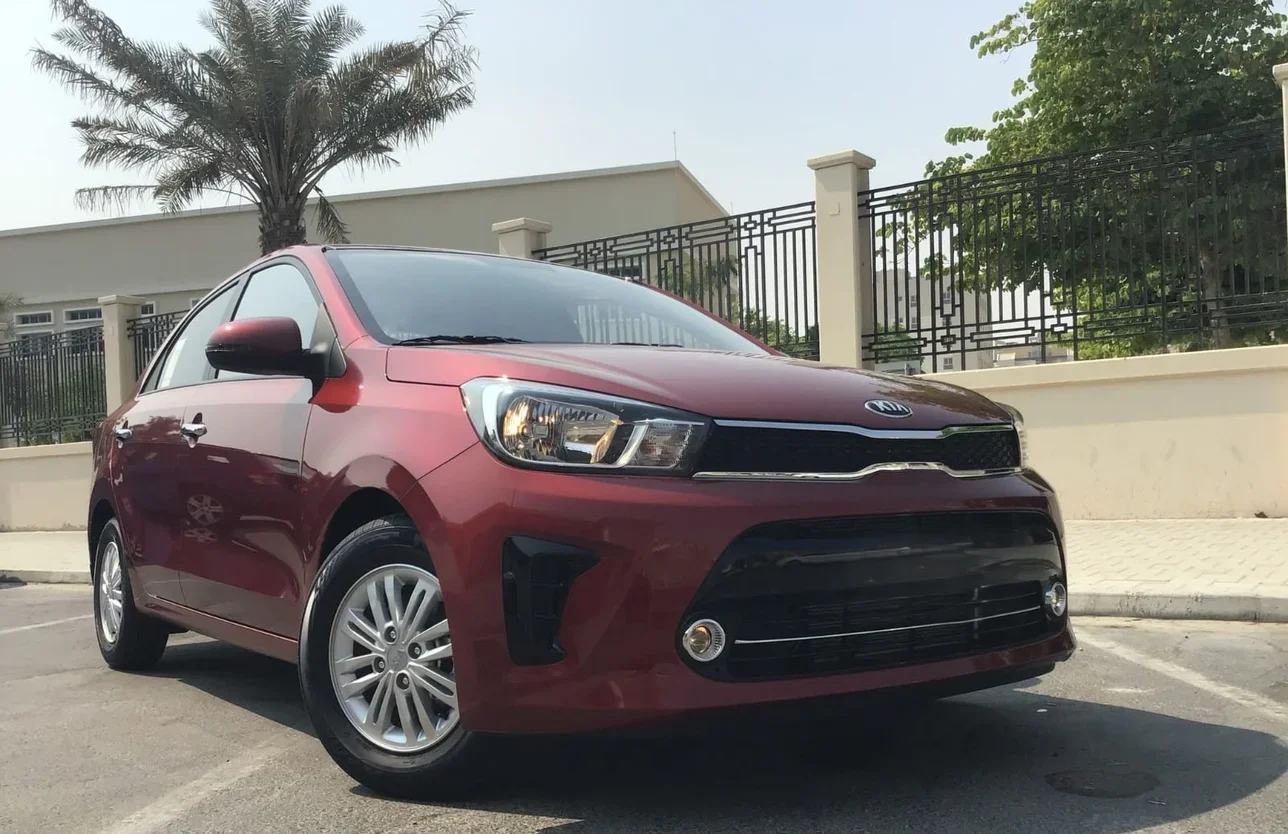 Kia  Pegas  4 Cylinder  Sedan  Red  2023