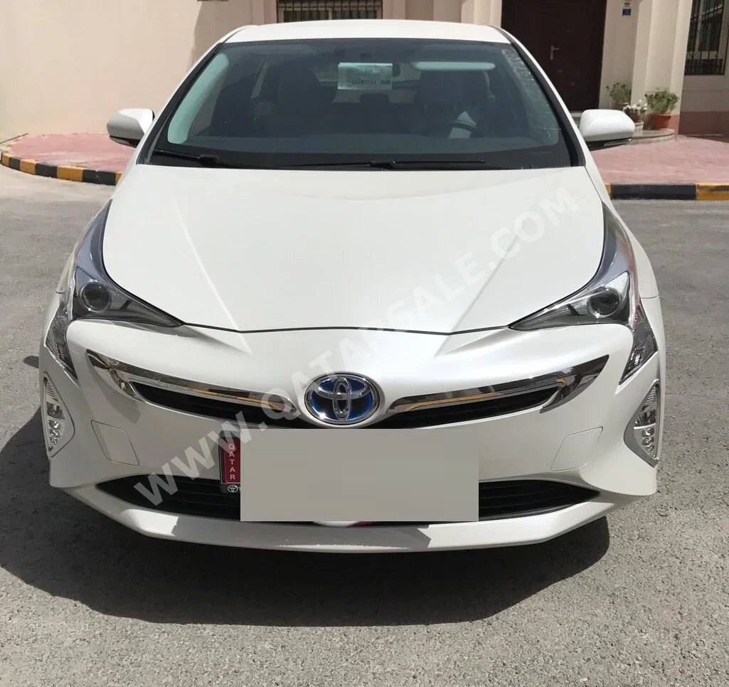 Toyota  Prius  Hybrid  2016  Automatic  58,000 Km  4 Cylinder  Front Wheel Drive (FWD)  Hatchback  White