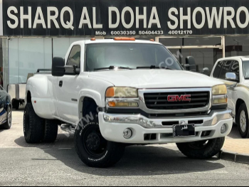 GMC  Sierra  3500  2006  Automatic  177,000 Km  8 Cylinder  Four Wheel Drive (4WD)  Pick Up  White