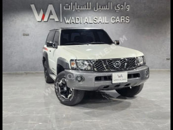 Nissan  Patrol  Super Safari  2022  Manual  24,000 Km  6 Cylinder  Four Wheel Drive (4WD)  SUV  White