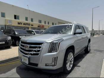 Cadillac  Escalade  2018  Automatic  92,000 Km  8 Cylinder  Four Wheel Drive (4WD)  SUV  Silver