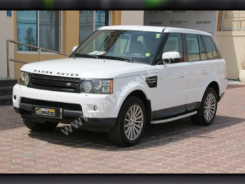 Land Rover  Range Rover  Sport HSE  2012  Automatic  155,000 Km  6 Cylinder  Four Wheel Drive (4WD)  SUV  White