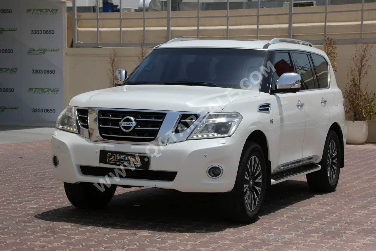 Nissan  Patrol  Platinum  2014  Automatic  170,000 Km  8 Cylinder  Four Wheel Drive (4WD)  SUV  White