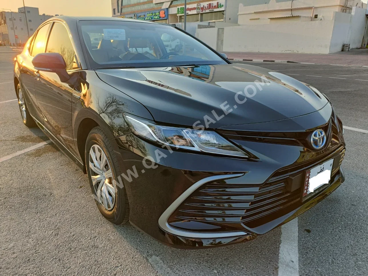 Toyota  Camry  Hybrid  2024  Automatic  0 Km  4 Cylinder  Front Wheel Drive (FWD)  Sedan  Black  With Warranty