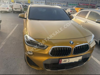 BMW  X-Series  X2 M  2018  Automatic  62,000 Km  4 Cylinder  Four Wheel Drive (4WD)  Hatchback  Gold