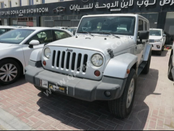 Jeep  Wrangler  Sahara  2012  Automatic  287,000 Km  6 Cylinder  Four Wheel Drive (4WD)  SUV  White