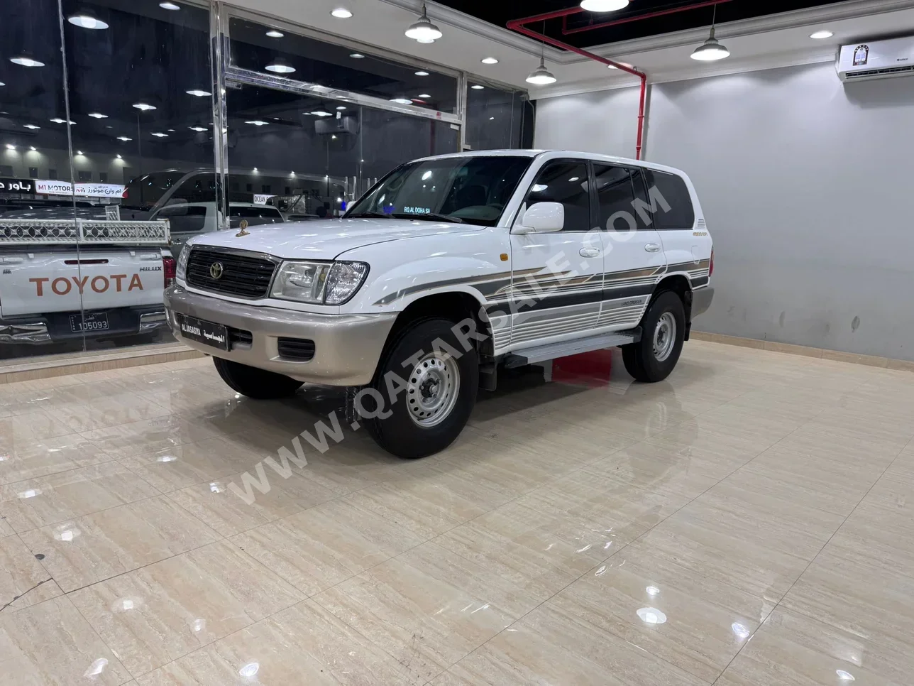 تويوتا  لاند كروزر  جي اكس ار  2002  عادي  589,000 كم  6 سلندر  دفع رباعي  اس يو في  أبيض