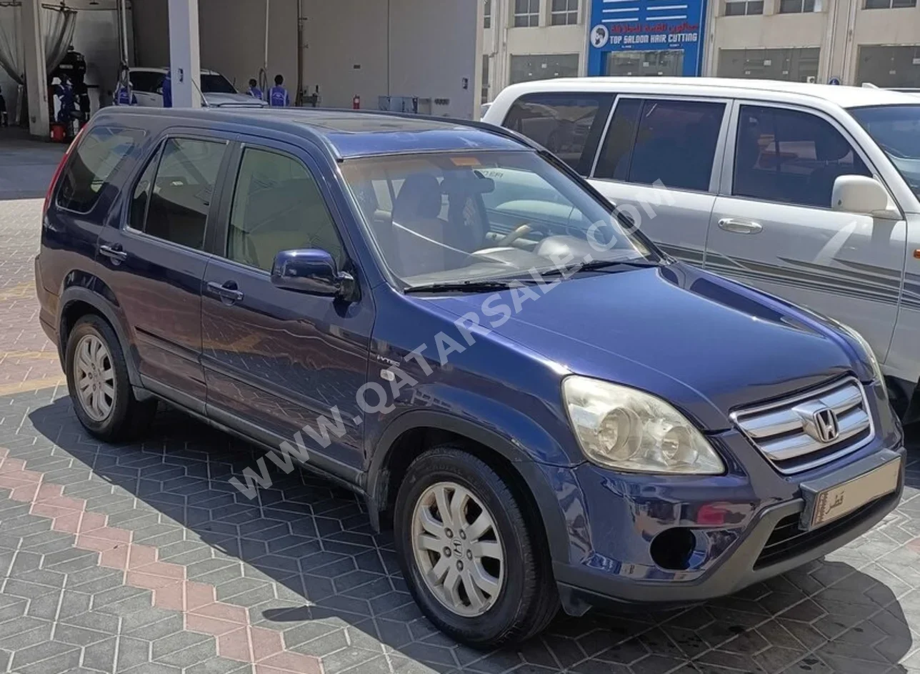 Honda  CRV  2006  Automatic  181,300 Km  4 Cylinder  All Wheel Drive (AWD)  SUV  Dark Blue