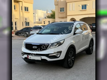 Kia  Sportage  2.4 LX  2016  Automatic  15,370 Km  4 Cylinder  All Wheel Drive (AWD)  SUV  White