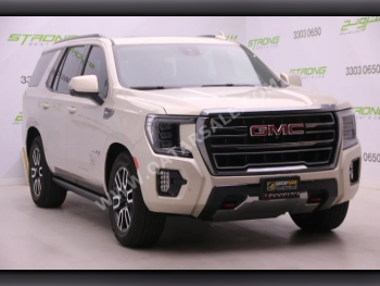 GMC  Yukon  AT 4  2023  Automatic  45,000 Km  8 Cylinder  Four Wheel Drive (4WD)  SUV  Gold  With Warranty