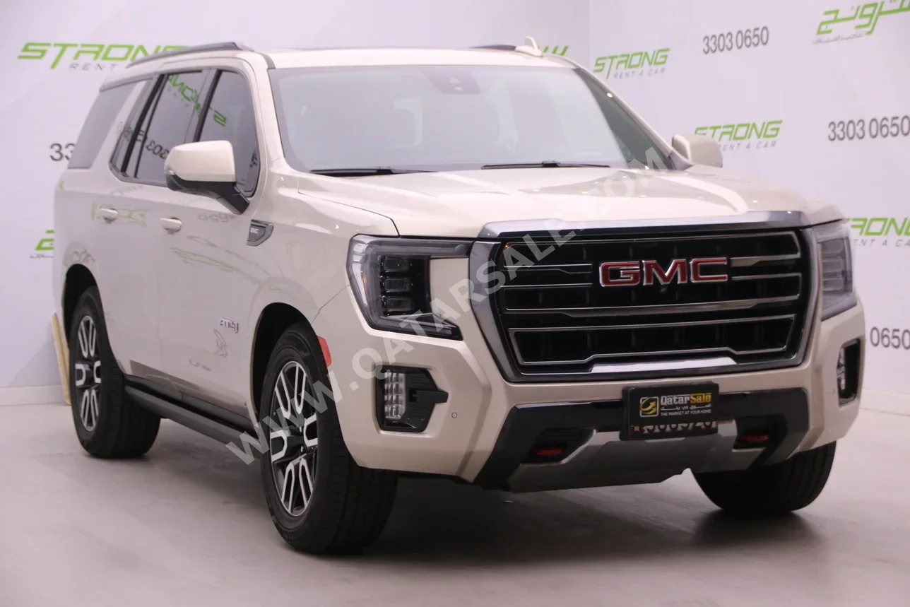GMC  Yukon  AT 4  2023  Automatic  45,000 Km  8 Cylinder  Four Wheel Drive (4WD)  SUV  Gold  With Warranty