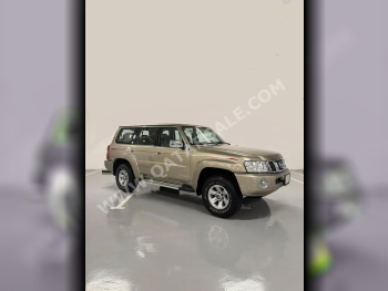 Nissan  Patrol  Safari  2023  Manual  12,000 Km  6 Cylinder  Four Wheel Drive (4WD)  SUV  Gold  With Warranty