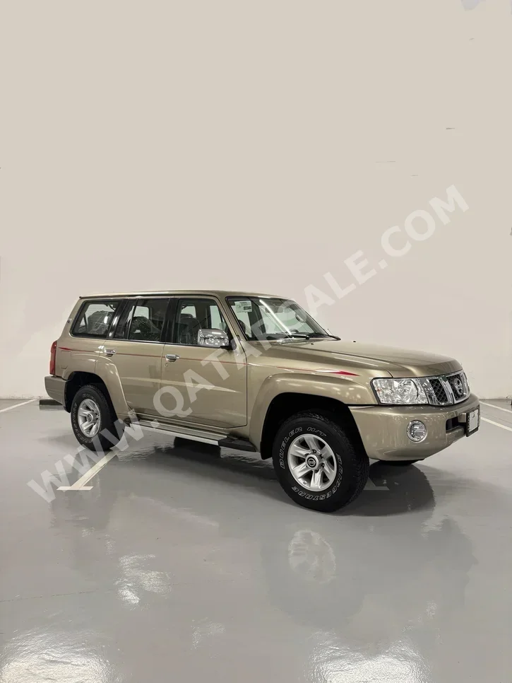Nissan  Patrol  Safari  2023  Manual  12,000 Km  6 Cylinder  Four Wheel Drive (4WD)  SUV  Gold  With Warranty