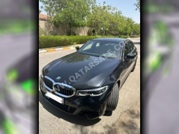 BMW  3-Series  330i  2021  Automatic  38,000 Km  4 Cylinder  Rear Wheel Drive (RWD)  Sedan  Black  With Warranty