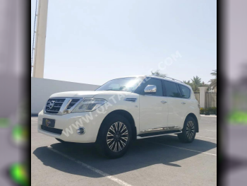 Nissan  Patrol  Platinum  2014  Automatic  160,000 Km  8 Cylinder  Four Wheel Drive (4WD)  SUV  White