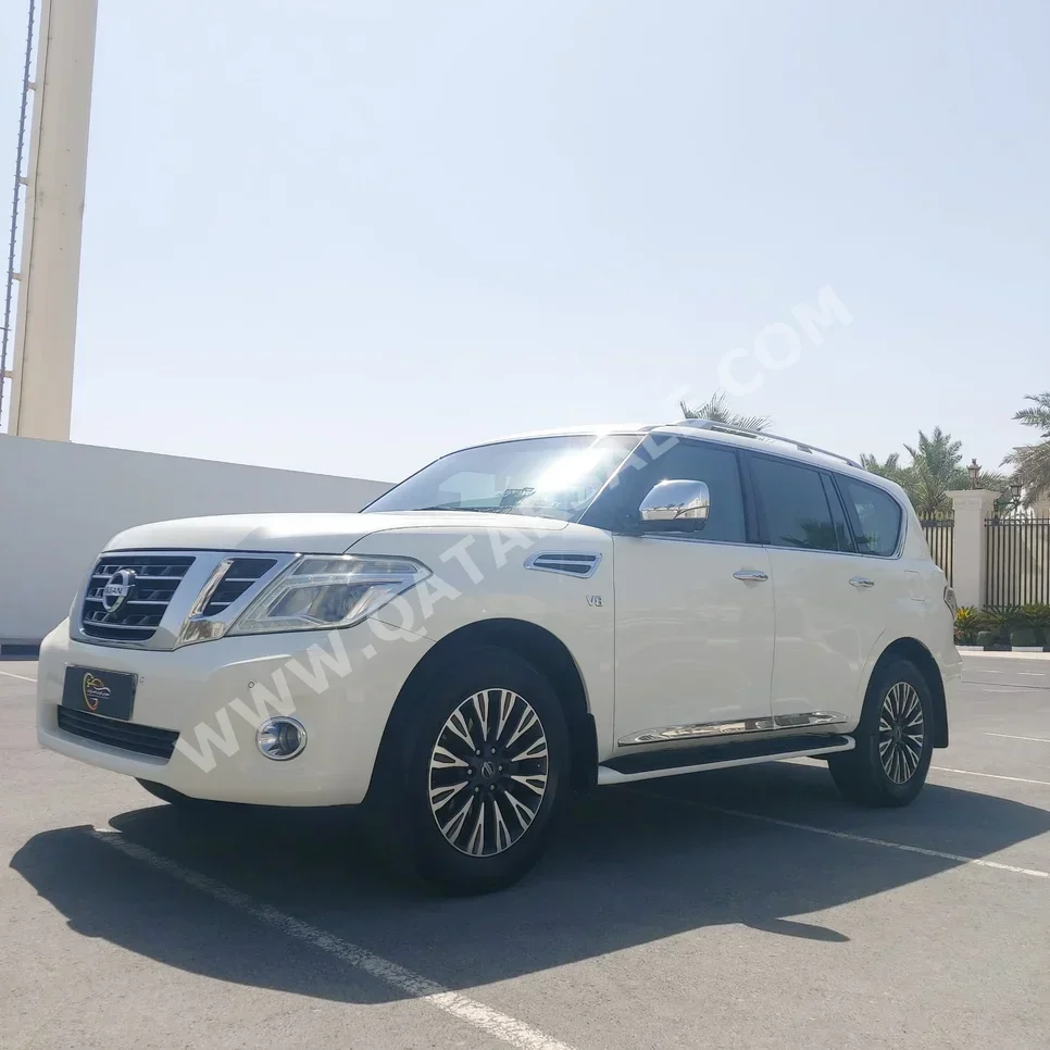 Nissan  Patrol  Platinum  2014  Automatic  160,000 Km  8 Cylinder  Four Wheel Drive (4WD)  SUV  White