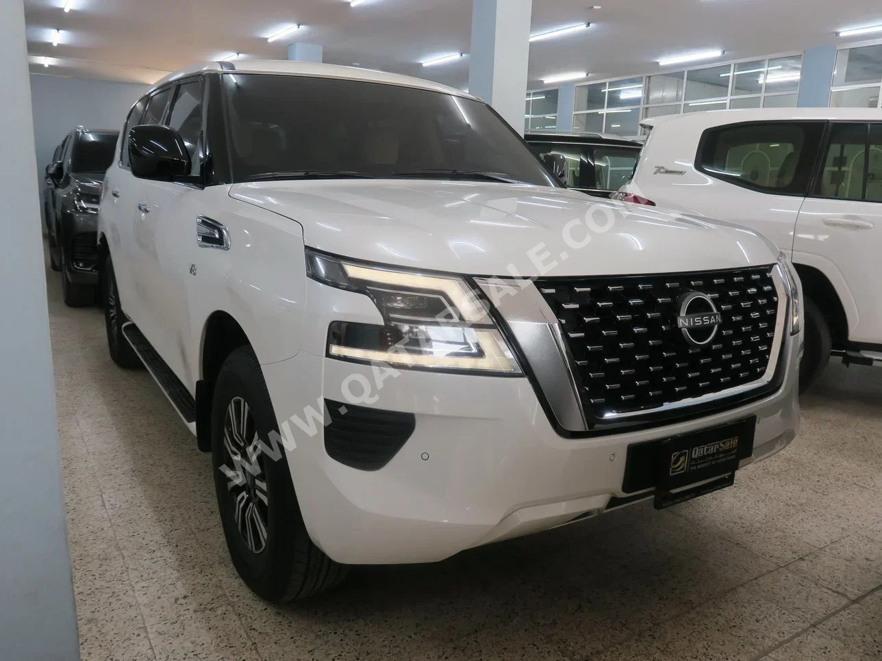 Nissan  Patrol  LE  2023  Automatic  23,000 Km  8 Cylinder  Four Wheel Drive (4WD)  SUV  White  With Warranty