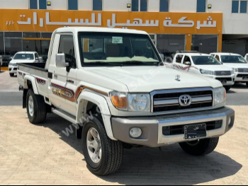تويوتا  لاند كروزر  ال اكس  2023  عادي  69,000 كم  6 سلندر  دفع رباعي  بيكب  أبيض  تحت الضمان
