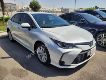 Toyota  Corolla  2024  Automatic  18,000 Km  4 Cylinder  Front Wheel Drive (FWD)  Sedan  White  With Warranty