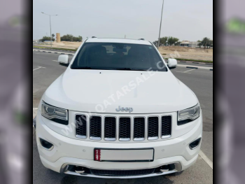 Jeep  Grand Cherokee  Overland  2016  Automatic  105,500 Km  8 Cylinder  Four Wheel Drive (4WD)  SUV  White