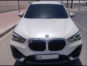 BMW  X-Series  X1  2021  Automatic  45,000 Km  4 Cylinder  Four Wheel Drive (4WD)  SUV  White  With Warranty