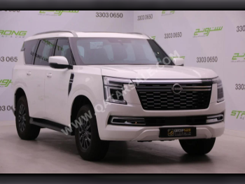 Nissan  Patrol  Titanium  2025  Automatic  8,000 Km  6 Cylinder  Four Wheel Drive (4WD)  SUV  White  With Warranty