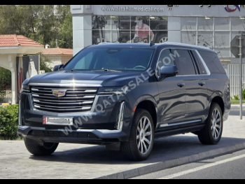 Cadillac  Escalade  Platinum  2021  Automatic  69,000 Km  8 Cylinder  Four Wheel Drive (4WD)  SUV  Gray  With Warranty