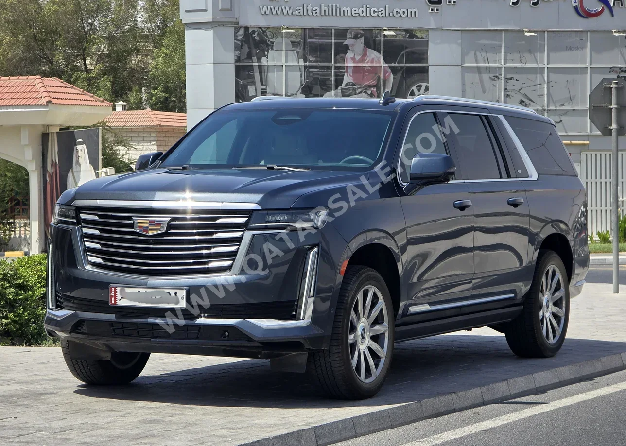 Cadillac  Escalade  Platinum  2021  Automatic  69,000 Km  8 Cylinder  Four Wheel Drive (4WD)  SUV  Gray  With Warranty