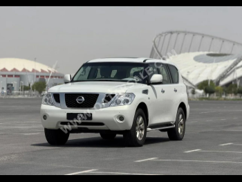 Nissan  Patrol  SE  2013  Automatic  172,000 Km  8 Cylinder  Four Wheel Drive (4WD)  SUV  White