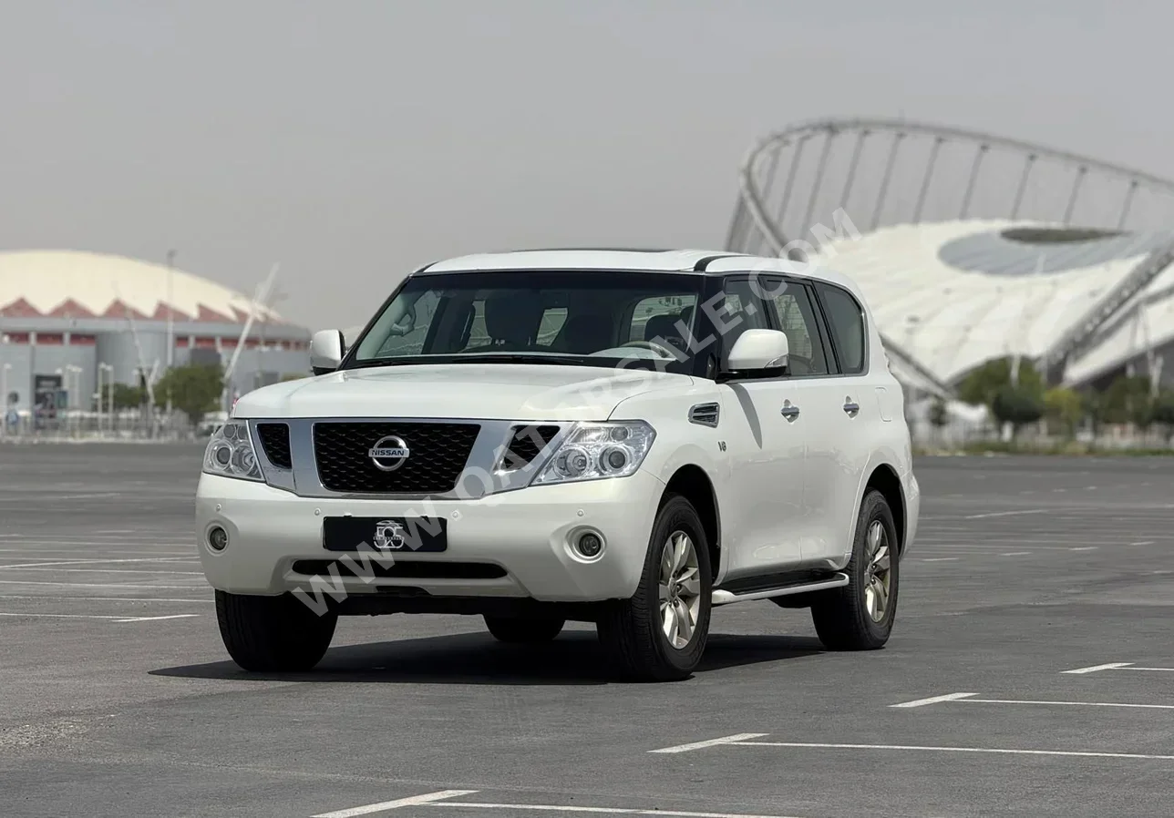 Nissan  Patrol  SE  2013  Automatic  172,000 Km  8 Cylinder  Four Wheel Drive (4WD)  SUV  White