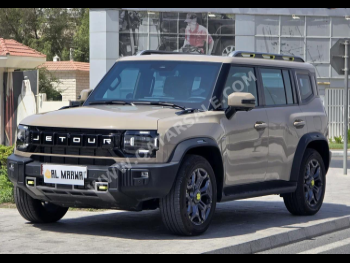Jetour  T2  2025  Automatic  2,000 Km  4 Cylinder  Four Wheel Drive (4WD)  SUV  Beige  With Warranty