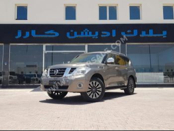 Nissan  Patrol  Platinum  2015  Automatic  213,000 Km  8 Cylinder  Four Wheel Drive (4WD)  SUV  Brown