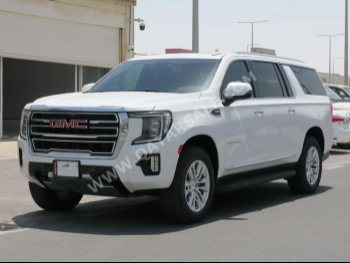 GMC  Yukon  SLT  2024  Automatic  19,500 Km  8 Cylinder  Four Wheel Drive (4WD)  SUV  White  With Warranty