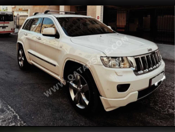 Jeep  Grand Cherokee  Overland  2011  Automatic  250,000 Km  8 Cylinder  Four Wheel Drive (4WD)  SUV  White