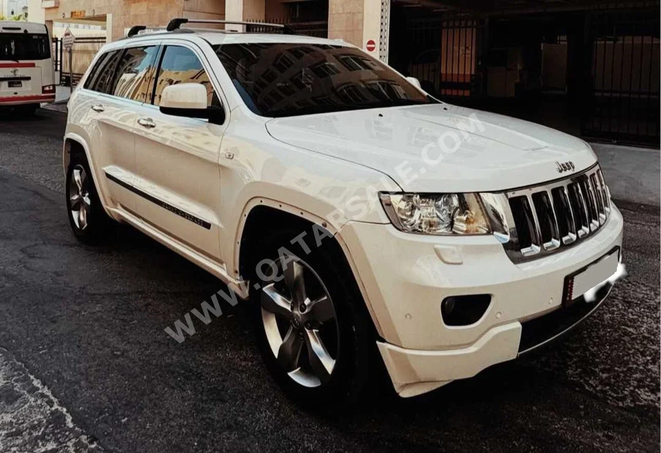 Jeep  Grand Cherokee  Overland  2011  Automatic  250,000 Km  8 Cylinder  Four Wheel Drive (4WD)  SUV  White