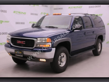 GMC  Suburban  2002  Automatic  152,000 Km  8 Cylinder  Four Wheel Drive (4WD)  SUV  Dark Blue