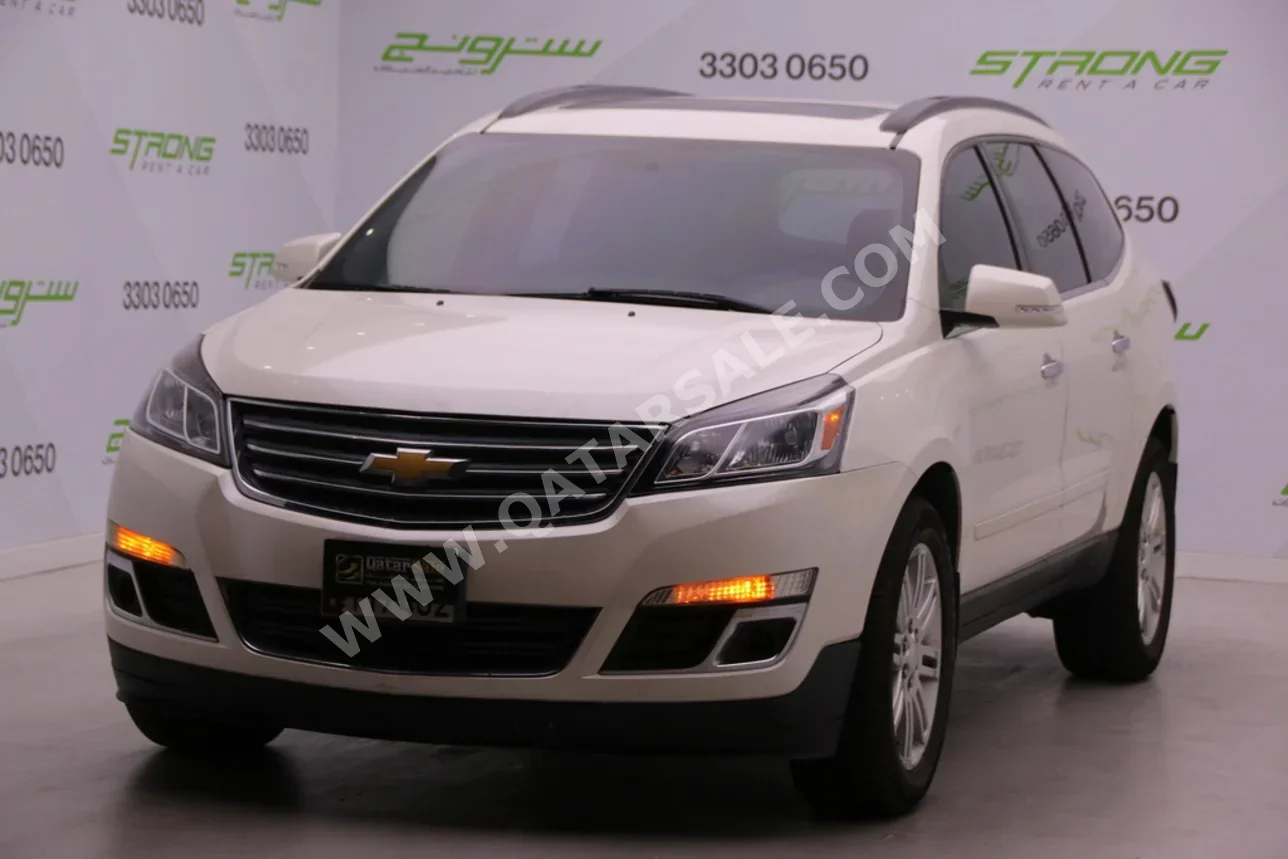 Chevrolet  Traverse  2013  Automatic  79,000 Km  6 Cylinder  Four Wheel Drive (4WD)  SUV  White