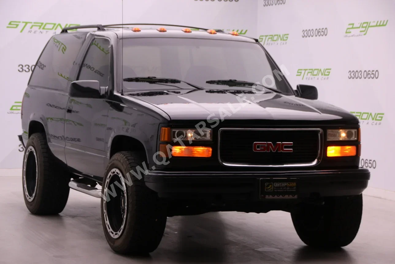 GMC  Yukon  1993  Automatic  210,000 Km  8 Cylinder  Four Wheel Drive (4WD)  SUV  Black